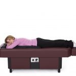 woman laying on stomach on hydrotable